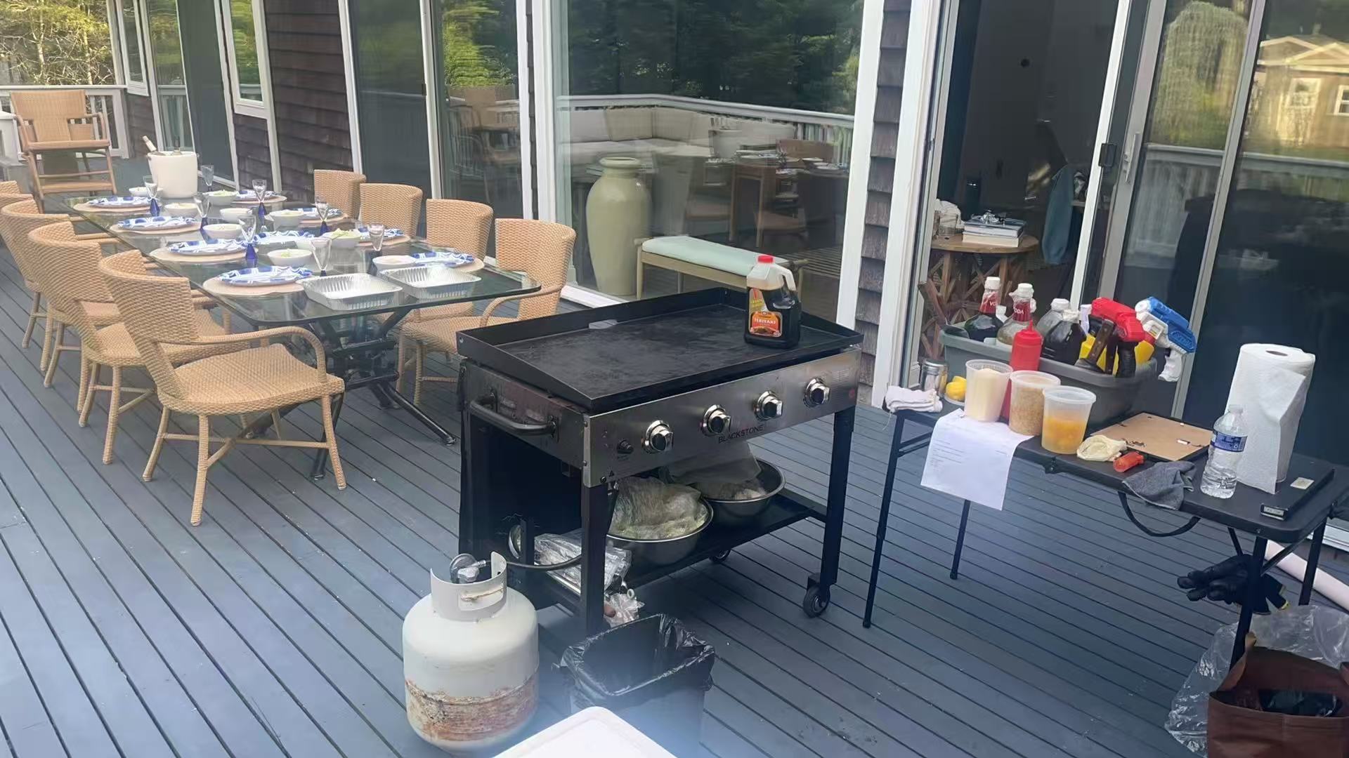 Elegant deck setup with hibachi grill ready for an event